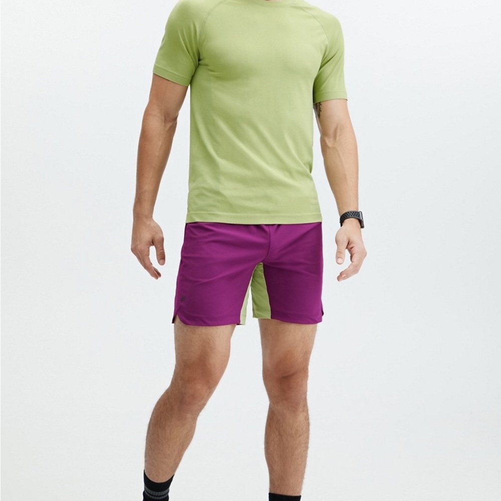 Fabletics Men's Athletic Shorts - The One Short 7” Unlined in Purple and Green.